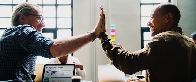 You and your manager high fiving each other